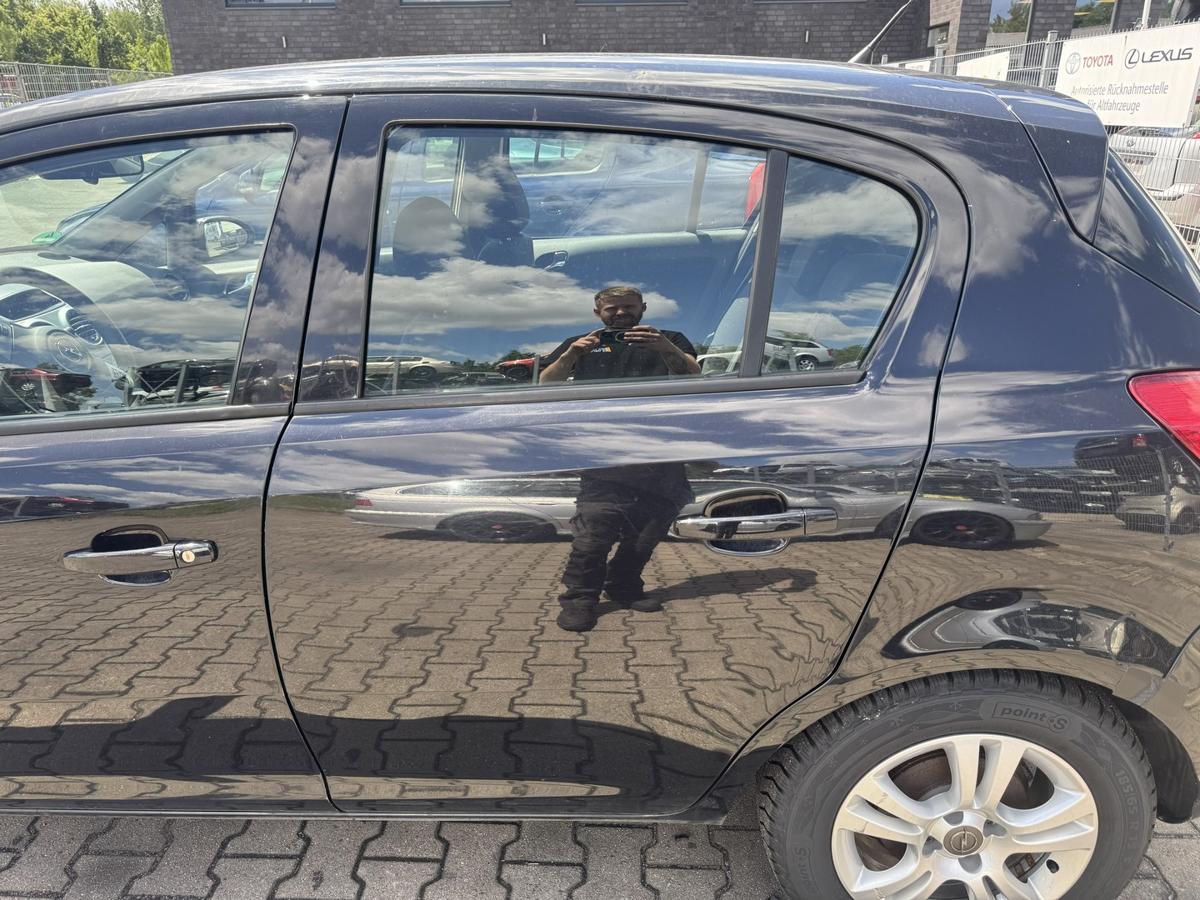 Opel Corsa D original T&uuml;r hinten links manueller Fensterheber Z20R Saphirschwarz Metallic Bj.2008